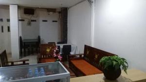 Posezení v ubytování Wisma Kencana + 2 fotografie