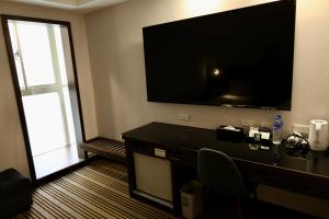 Sjónvarps- og/eða afþreyingartæki á Hub Hotel - Zhongshan Branch