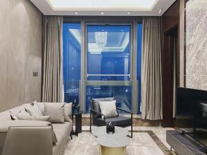 Posezení v ubytování Roosevelt Service Apartment Chongqing Jiefangbei Pedestrian Street Hongyadong Branch