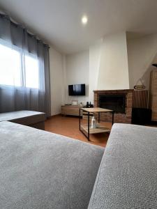Posteľ alebo postele v izbe v ubytovaní Duplex Arrebol + 25 fotografií