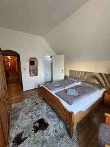 Postel nebo postele na pokoji v ubytování Hotel Mühleneck