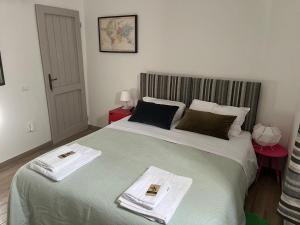 Postel nebo postele na pokoji v ubytování B&B Annabella
