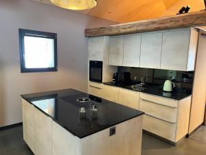 Kuchyň nebo kuchyňský kout v ubytování Chalet Charbon