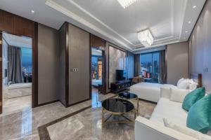 Posezení v ubytování Roosevelt Service Apartment Chongqing Jiefangbei Pedestrian Street Hongyadong Branch