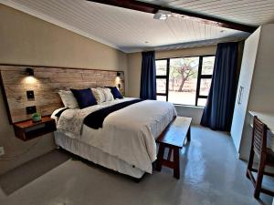 Ένα ή περισσότερα κρεβάτια σε δωμάτιο στο White Sparrow Villa +53 φωτογραφίες