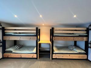 Postel nebo postele na pokoji v ubytování Chalet Charbon