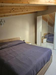 Ένα ή περισσότερα κρεβάτια σε δωμάτιο στο BnB Scarmagno