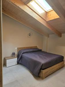 Ένα ή περισσότερα κρεβάτια σε δωμάτιο στο BnB Scarmagno