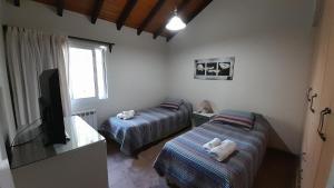 Postel nebo postele na pokoji v ubytování Casa Relax Liniers Chacras de Coria + 29 fotografií