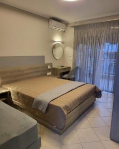 A bed or beds in a room at House Spanos