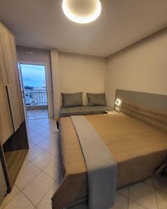 A bed or beds in a room at House Spanos