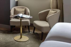 منطقة جلوس في NH Collection Salzburg City