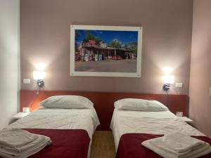 Postel nebo postele na pokoji v ubytování Motel Vespucci