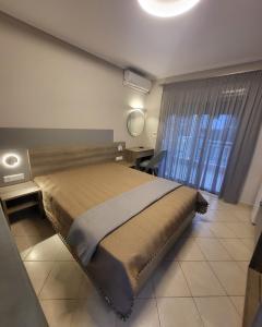 A bed or beds in a room at House Spanos