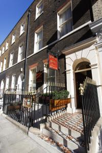 a building with a sign on the front of it at Morgan Hotel in London