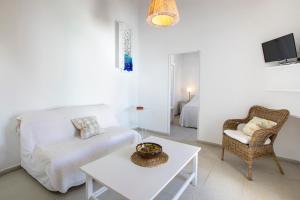 TV a/nebo společenská místnost v ubytování Apartamentos Can Guasch Formentera