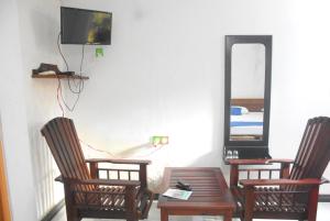 TV o dispositivi per l'intrattenimento presso Tunnel Side Hotel Ramboda
