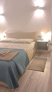 Ένα ή περισσότερα κρεβάτια σε δωμάτιο στο Casa Oleandri