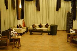 Posezení v ubytování TGN SUITES - HOTEL
