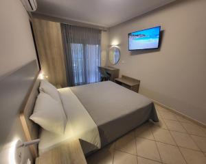 A bed or beds in a room at House Spanos