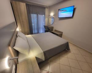 A bed or beds in a room at House Spanos