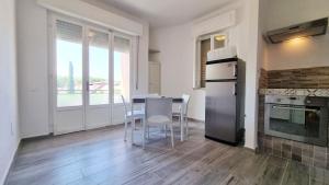 Kuchyň nebo kuchyňský kout v ubytování Casa Del Sole - Mazzanta + 3 fotografie