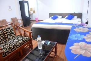 Letto o letti in una camera di Tunnel Side Hotel Ramboda