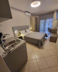 A bed or beds in a room at House Spanos
