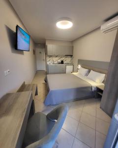 A bed or beds in a room at House Spanos