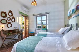 Ένα ή περισσότερα κρεβάτια σε δωμάτιο στο Villa Rouga +54 φωτογραφίες