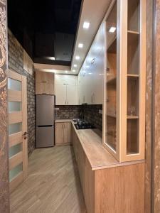 Kuchyň nebo kuchyňský kout v ubytování Marika apartment