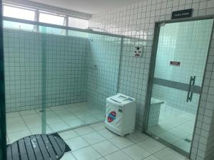 a bathroom with a shower and a toilet in it at Hospedagem Executiva Águas Claras in Brasília +33 photos