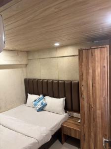 Postel nebo postele na pokoji v ubytování Hotel Prime Residency