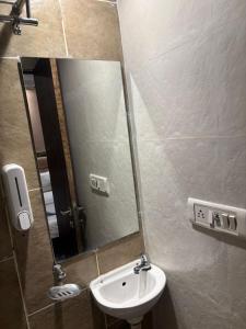 Koupelna v ubytování Hotel Prime Residency