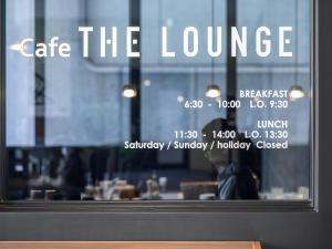 a cafe the lounge sign in a window at Mitsui Garden Hotel Kyobashi - Tokyo Station in Tokyo +52 photos