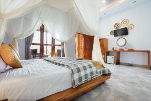 Postel nebo postele na pokoji v ubytování Rana Suite + 37 fotografií