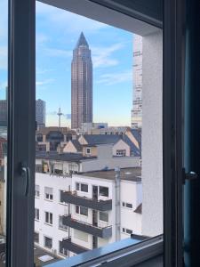 a view of a city from a window at Mooncity Hotel & Boardinghouse in Frankfurt