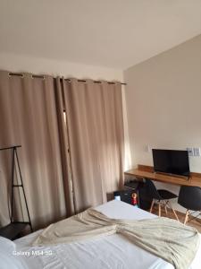 Μια τηλεόραση ή/και κέντρο ψυχαγωγίας στο Pousada Vista Bela