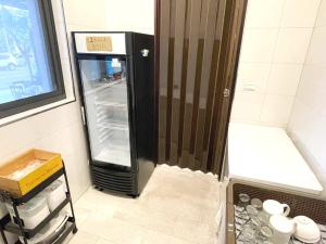 Cucina o angolo cottura di 阿郎衝浪旅店A-lang Surfing House