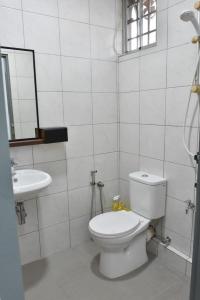 Koupelna v ubytování Rain Tree Homestay