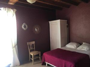 Postel nebo postele na pokoji v ubytování grande maison familiale + 19 fotografií