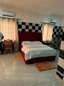 Postel nebo postele na pokoji v ubytování Motel Africa pas Chers