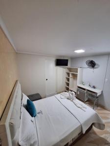 Hotel Jose Ignacio Chepen客房内的一张或多张床位