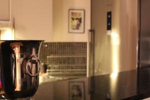 a coffee pot sitting on a counter in a kitchen at OSLO S, City Center Apartments in Oslo