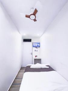 Postel nebo postele na pokoji v ubytování Hotel Winton