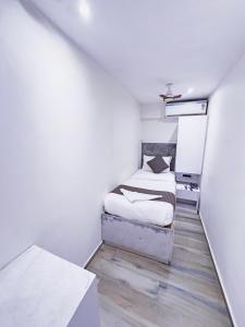 Postel nebo postele na pokoji v ubytování Hotel Winton