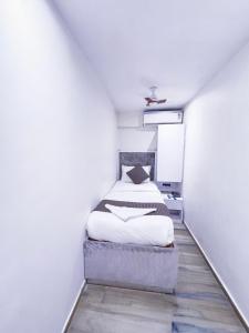 Postel nebo postele na pokoji v ubytování Hotel Winton