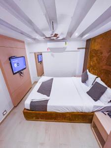 Postel nebo postele na pokoji v ubytování Hotel Winton