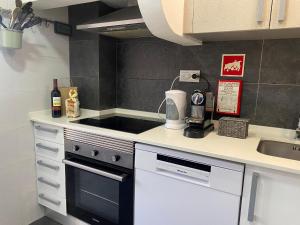 Η κουζίνα ή μικρή κουζίνα στο Piedade Central Apartment with Terrace