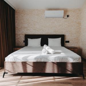 Postel nebo postele na pokoji v ubytování Avrasya Inn Hotel